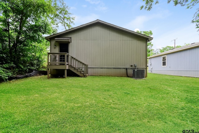 613 S Baxter, Tyler, TX 75701 - rear view of house with a lawn