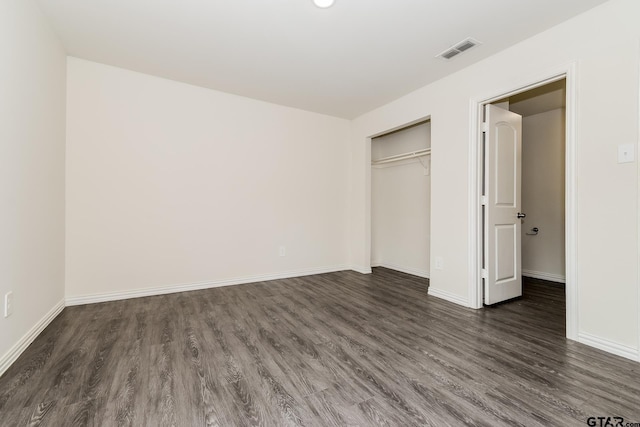 613 S Baxter, Tyler, TX 75701 - unfurnished bedroom featuring wood finished floors and a closet