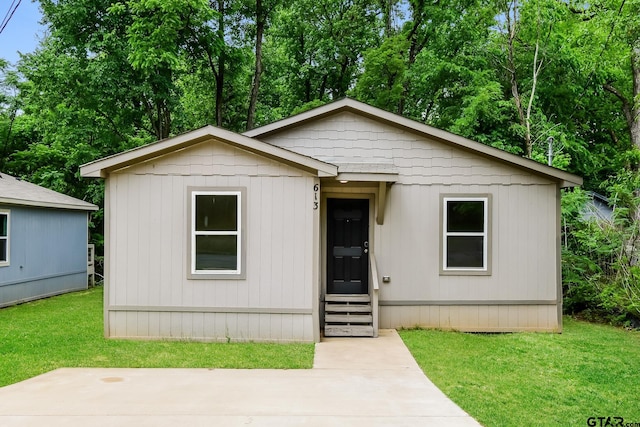 613 S Baxter, Tyler, TX 75701 - view of front facade featuring entry steps and a front yard