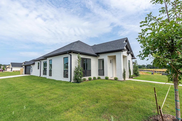 414 Bluebonnet Cir, Chandler, TX 75758 - view of front of property featuring brick siding, a garage, and a front yard