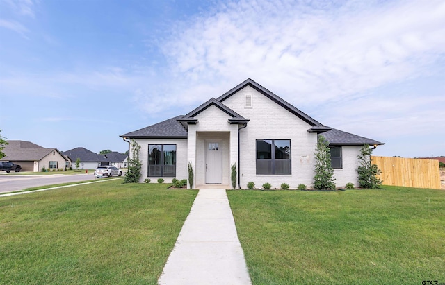 414 Bluebonnet Cir, Chandler, TX 75758 - view of front of property with brick siding and a shingled roof