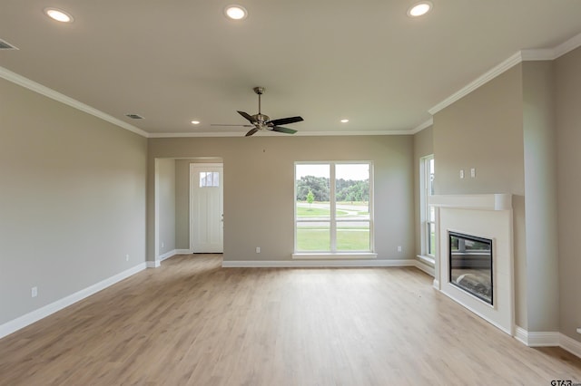 414 Bluebonnet Cir, Chandler, TX 75758 - unfurnished living room featuring recessed lighting, light wood-style floors, baseboards, a glass covered fireplace, and a ceiling fan