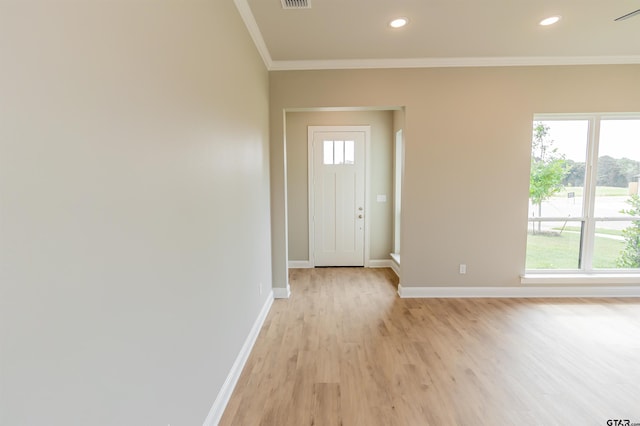 414 Bluebonnet Cir, Chandler, TX 75758 - foyer entrance with crown molding, light wood-style flooring, baseboards, and recessed lighting