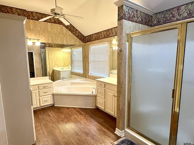 full bath featuring wallpapered walls, a garden tub, wood finished floors, and a stall shower