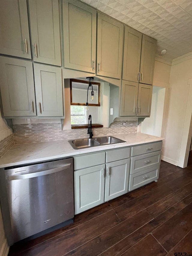 kitchen featuring backsplash, dishwasher, dark hardwood / wood-style floors, and sink