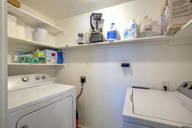 laundry room featuring washing machine and dryer