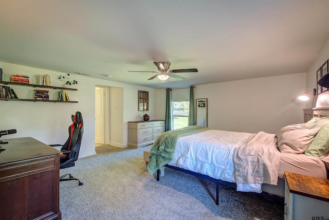 bedroom featuring ceiling fan and light colored carpet