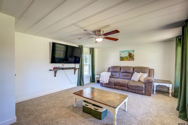 carpeted living room featuring ceiling fan