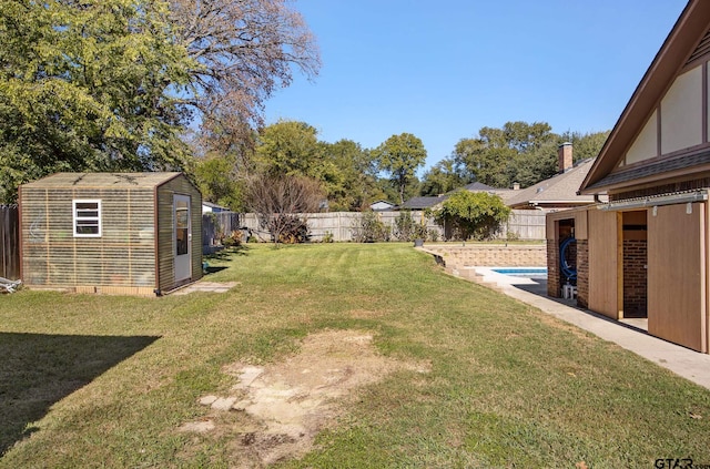 view of yard with a storage shed