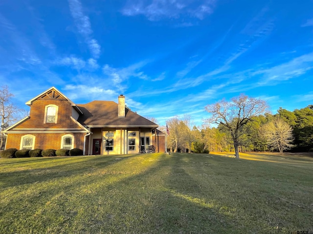 view of front of home with a front yard