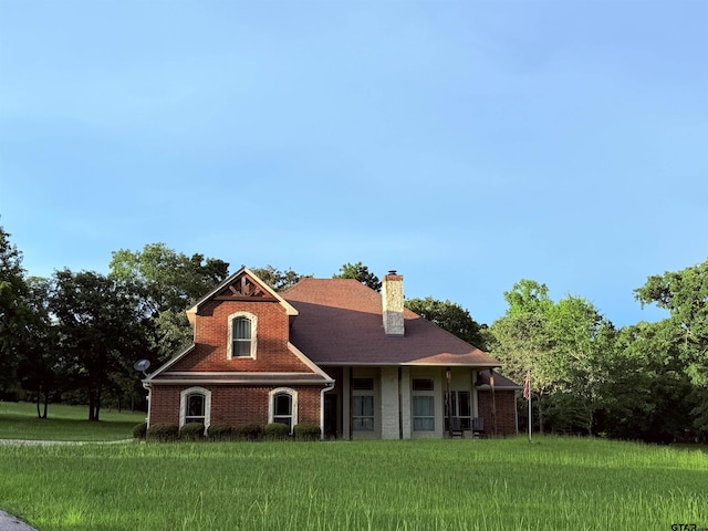 102 Acr 3192, Frankston, TX 75763 - view of front of property featuring a front yard, brick siding, and a chimney
