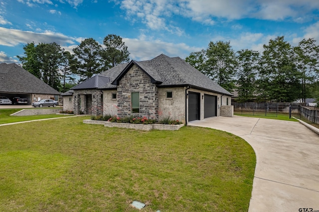 1569 Cooks Xing, Tyler, TX 75703 - french country style house featuring concrete driveway, an attached garage, stone siding, and brick siding