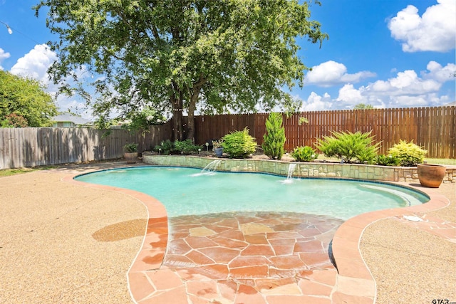 view of swimming pool with a patio area and pool water feature