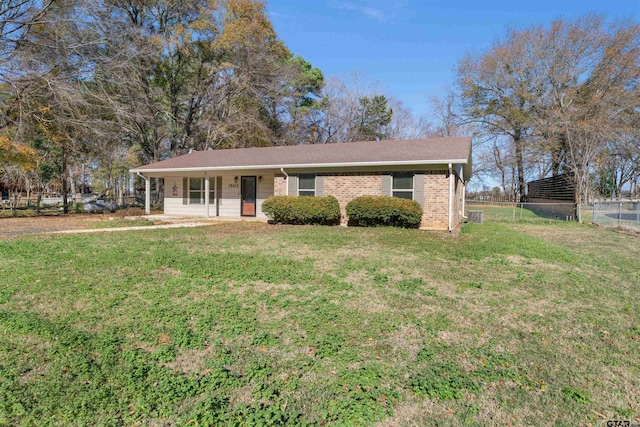 ranch-style home with a front yard