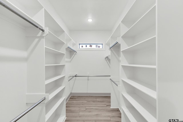 walk in closet featuring light wood-type flooring