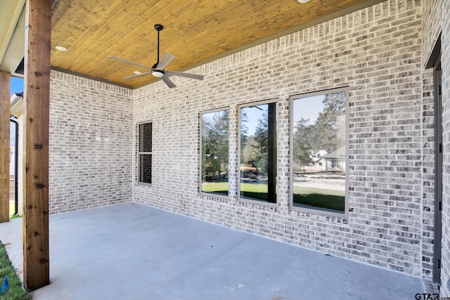 view of patio featuring ceiling fan