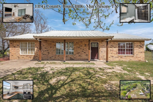 single story home with a front lawn, brick siding, metal roof, and a sink