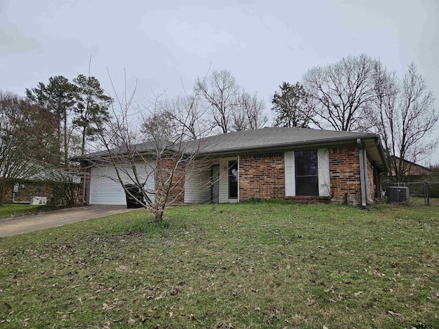 single story home featuring brick siding, concrete driveway, an attached garage, cooling unit, and a front lawn