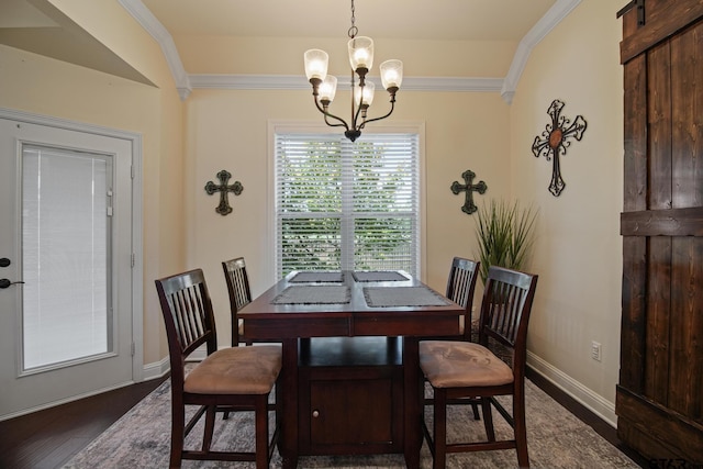 109 Nathan, Chandler, TX 75758 - dining area featuring crown molding, dark wood-style flooring, and a chandelier