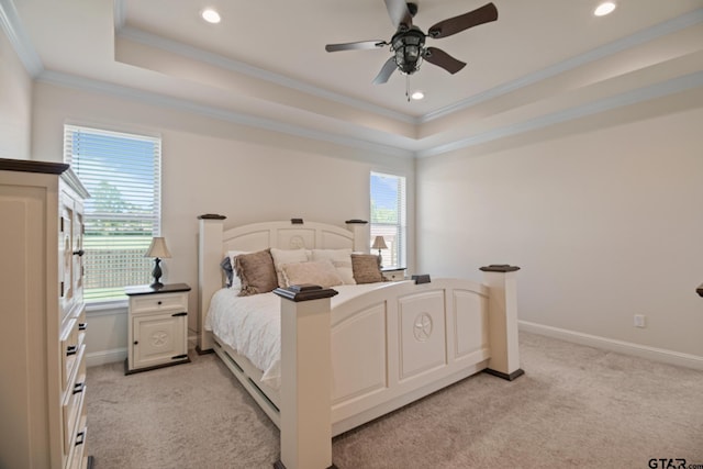 109 Nathan, Chandler, TX 75758 - bedroom with a tray ceiling, light colored carpet, recessed lighting, ornamental molding, and ceiling fan