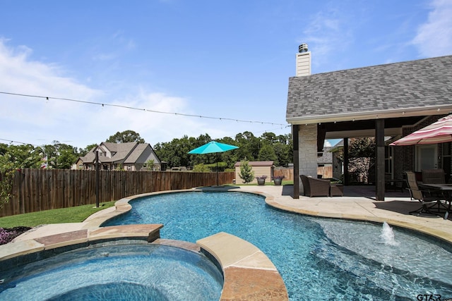 109 Nathan, Chandler, TX 75758 - view of pool featuring a fenced backyard, a patio area, and a pool with connected hot tub