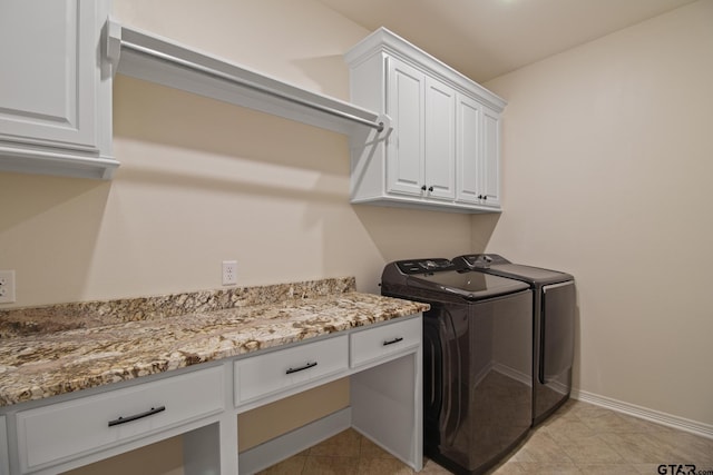 109 Nathan, Chandler, TX 75758 - laundry area with washing machine and clothes dryer, cabinet space, and light tile patterned floors