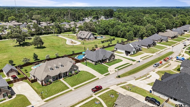 109 Nathan, Chandler, TX 75758 - aerial view of residential area with a forest