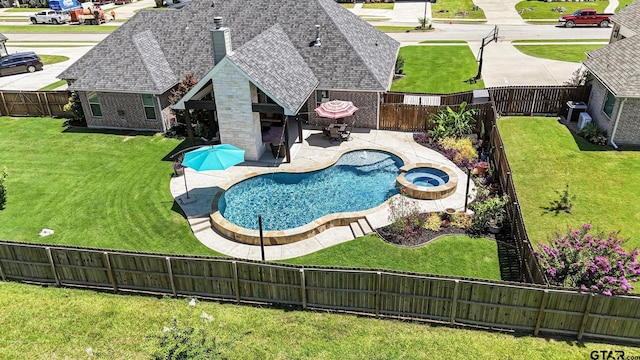 109 Nathan, Chandler, TX 75758 - view of swimming pool with a fenced backyard, a pool with connected hot tub, and a patio
