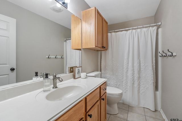 full bathroom with tile patterned flooring, vanity, and toilet