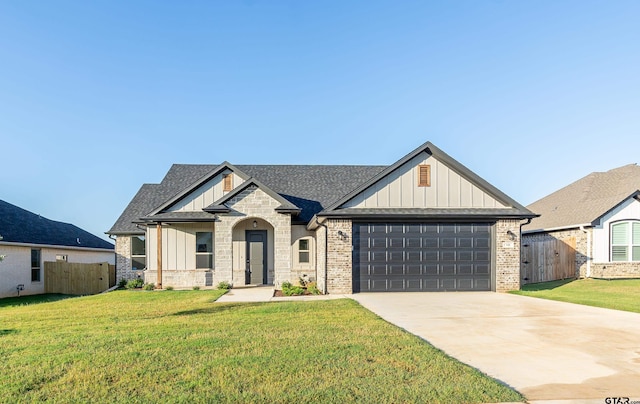 view of front of house featuring a garage, board and batten siding, fence, and driveway
