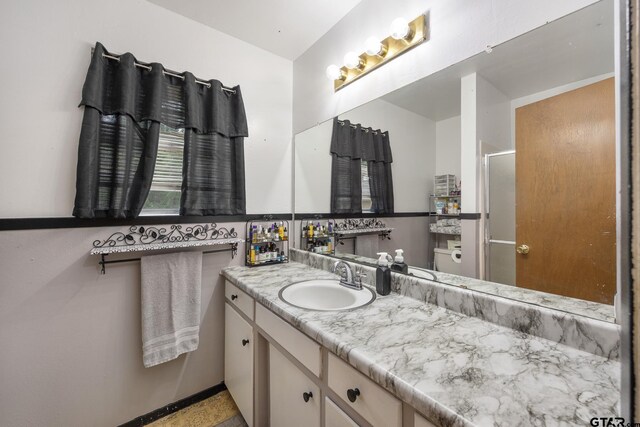 9961 Creek Bend Dr, Tyler, TX 75707 - full bathroom with vanity and a stall shower
