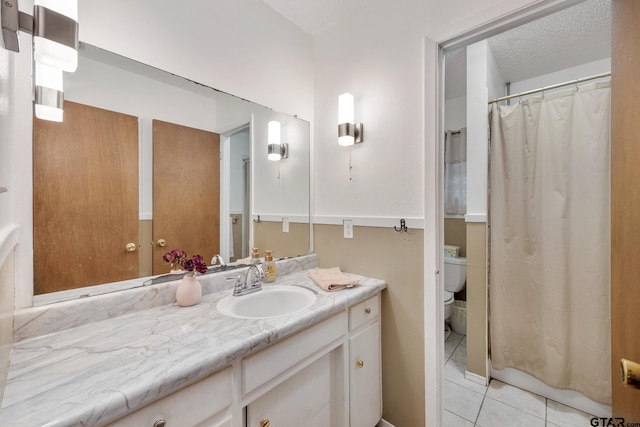 9961 Creek Bend Dr, Tyler, TX 75707 - full bath with vanity, tile patterned flooring, toilet, and curtained shower