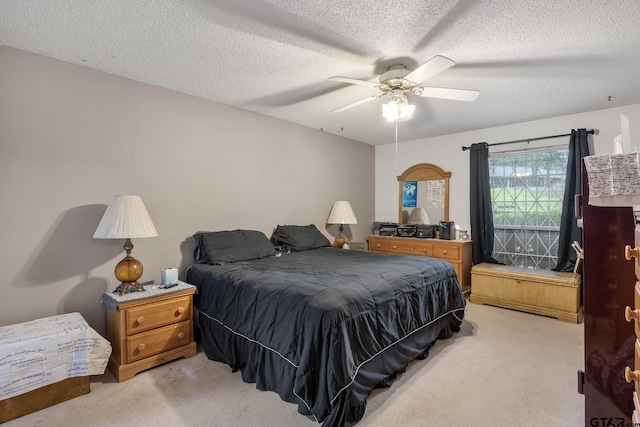 9961 Creek Bend Dr, Tyler, TX 75707 - bedroom featuring light carpet, a ceiling fan, and a textured ceiling