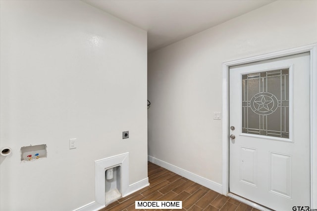 washroom with hookup for an electric dryer, washer hookup, and dark hardwood / wood-style floors