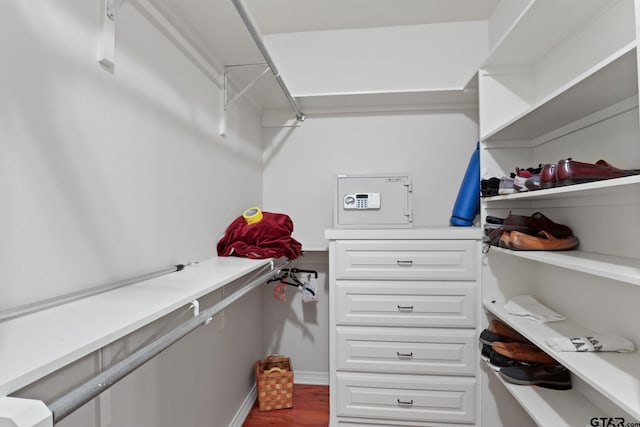 walk in closet featuring hardwood / wood-style floors