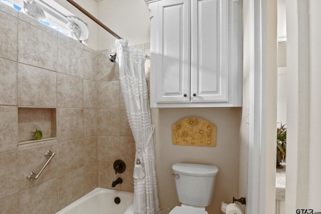 bathroom featuring toilet and shower / bath combo