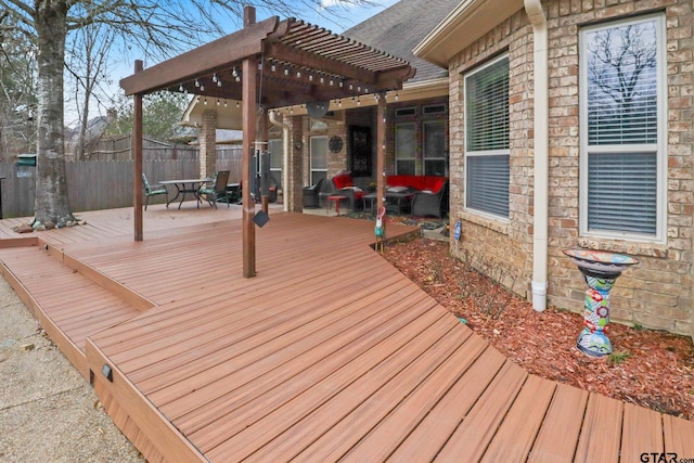 deck featuring a patio and a pergola