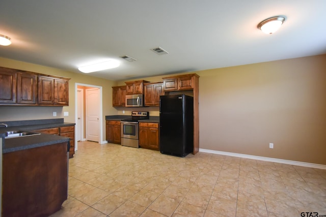 kitchen with stainless steel appliances and sink