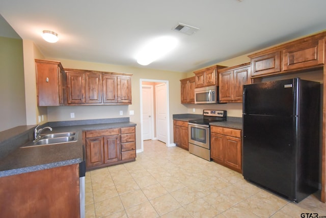 kitchen with stainless steel appliances and sink