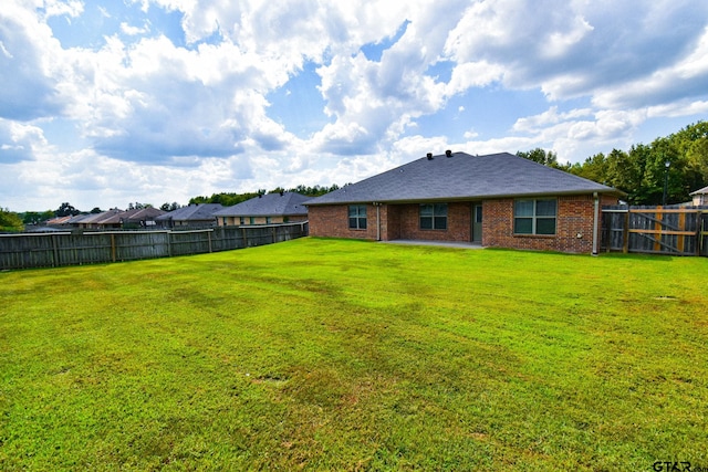 view of yard with a patio area