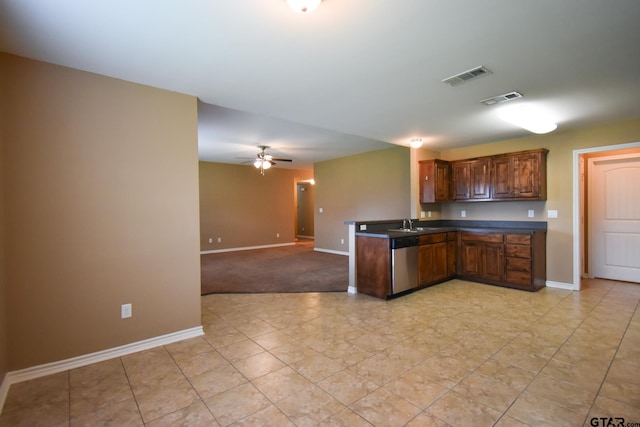 kitchen featuring dishwasher, kitchen peninsula, sink, and ceiling fan