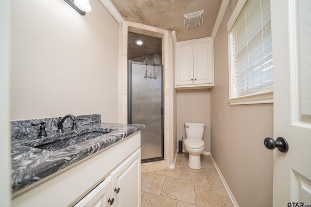 bathroom featuring a shower with door, toilet, tile patterned flooring, and vanity