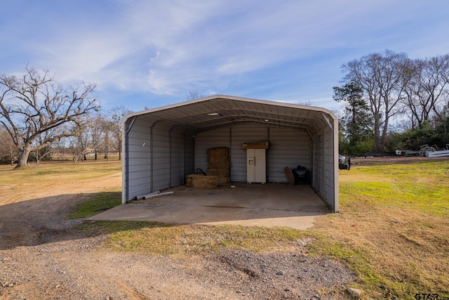 view of outdoor structure with a carport