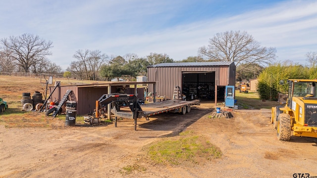 view of outbuilding with a garage