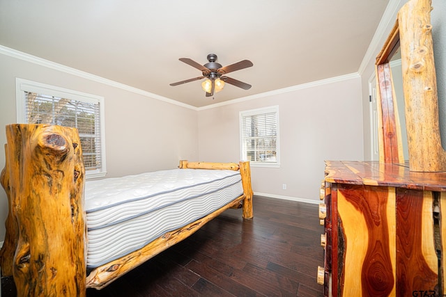 bedroom with ceiling fan, crown molding, dark hardwood / wood-style floors, and multiple windows