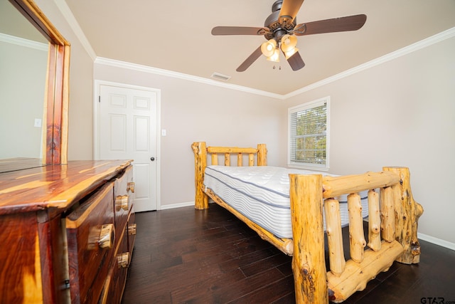 bedroom with crown molding, dark wood-type flooring, and ceiling fan