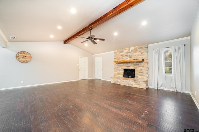 unfurnished living room featuring ceiling fan, vaulted ceiling with beams, dark hardwood / wood-style floors, and a stone fireplace