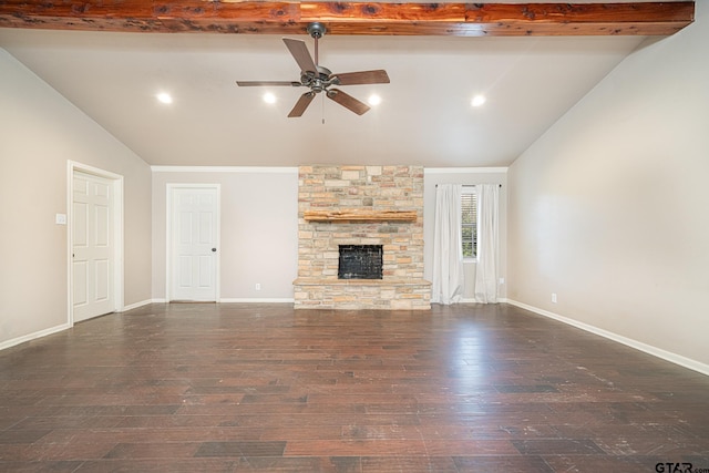 unfurnished living room featuring ceiling fan, dark wood-type flooring, lofted ceiling with beams, and a fireplace