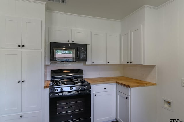 3803 Peavine Rd, Kilgore, TX 75662 - kitchen with black appliances, butcher block countertops, tasteful backsplash, white cabinetry, and crown molding