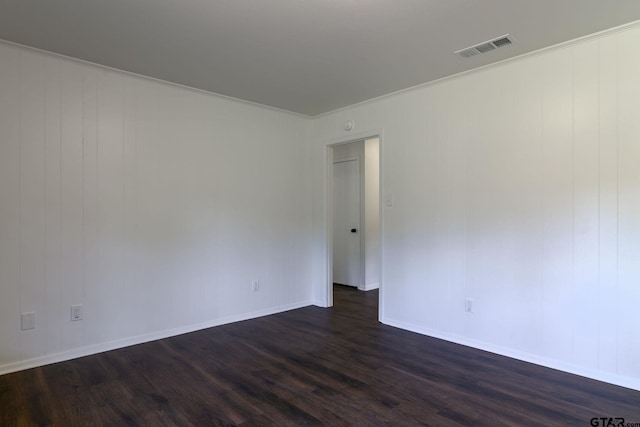 3803 Peavine Rd, Kilgore, TX 75662 - empty room featuring dark wood-style floors and baseboards